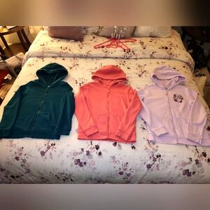 3 items bundle set. 3 zip up girls hoodies sizes 8 and one size 7